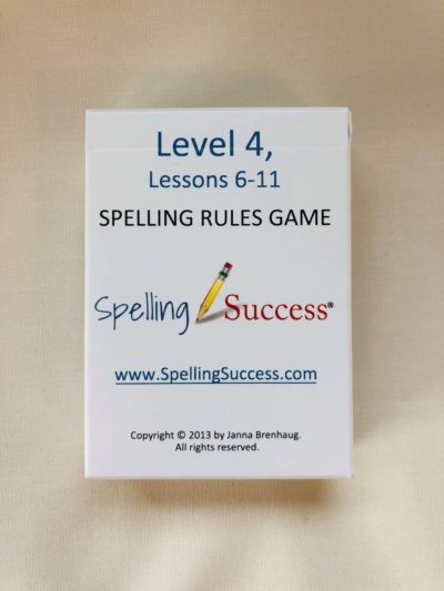 An physical white tuck box case for the Level 4 Spelling Rules Game lessons 6-11