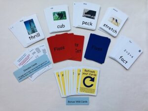 White cards with pictures of objects on them.