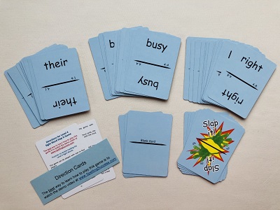Blue cards with pictures of sight words on them.