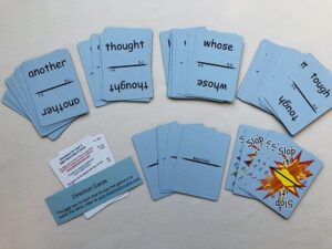 Blue cards with pictures of sight words on them.