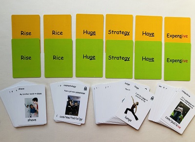 yellow cards and green educational cards with 4 piles of white cards for the Level 6 Spelling Rules Lessons 3 & 4 game