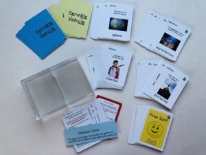 Blue and yellow cards with pictures of sight words on them and white cards with pictures of objects on them.