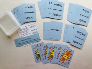 Blue cards with pictures of sight words on them.