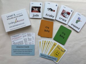 An physical white tuck box case for the Level 4 Spelling Rules Game lessons 1-5