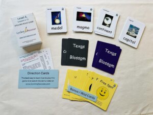 An physical white tuck box case for the Level 4 Spelling Rules Game lessons 6-11